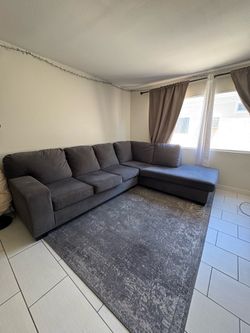 L shaped gray couch