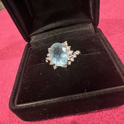 Aquamarine ring with diamond