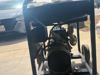 Portable Gas-Powered Generator on Wheel Frame