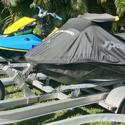 Pair 2023 Yamaha Jet Blaster And 2022 Sea-Doo TRIXX Titles, Only 40 Hours On Both Skies. Aluminum Trailer. Ready To Have Fun On The Water
