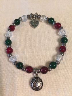 Handmade Stretch Bracelet with Glass Beads and Charm. 131