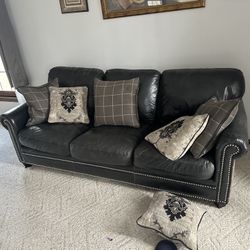 Leather love seat and couch 
