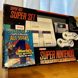 Super Nintendo SNES console box with manuals and posters