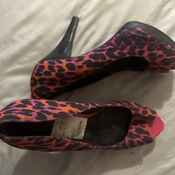 10 Pink/black/orange heels Make offer