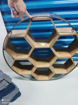Honeycomb wall shelf