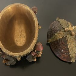 bohemian-style bowl made of resin, featuring four playful monkey