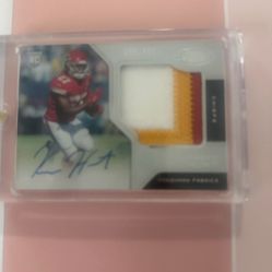 Kareem Hunt Autographed Football Trading Card with Red and White Jersey Patch 165/499