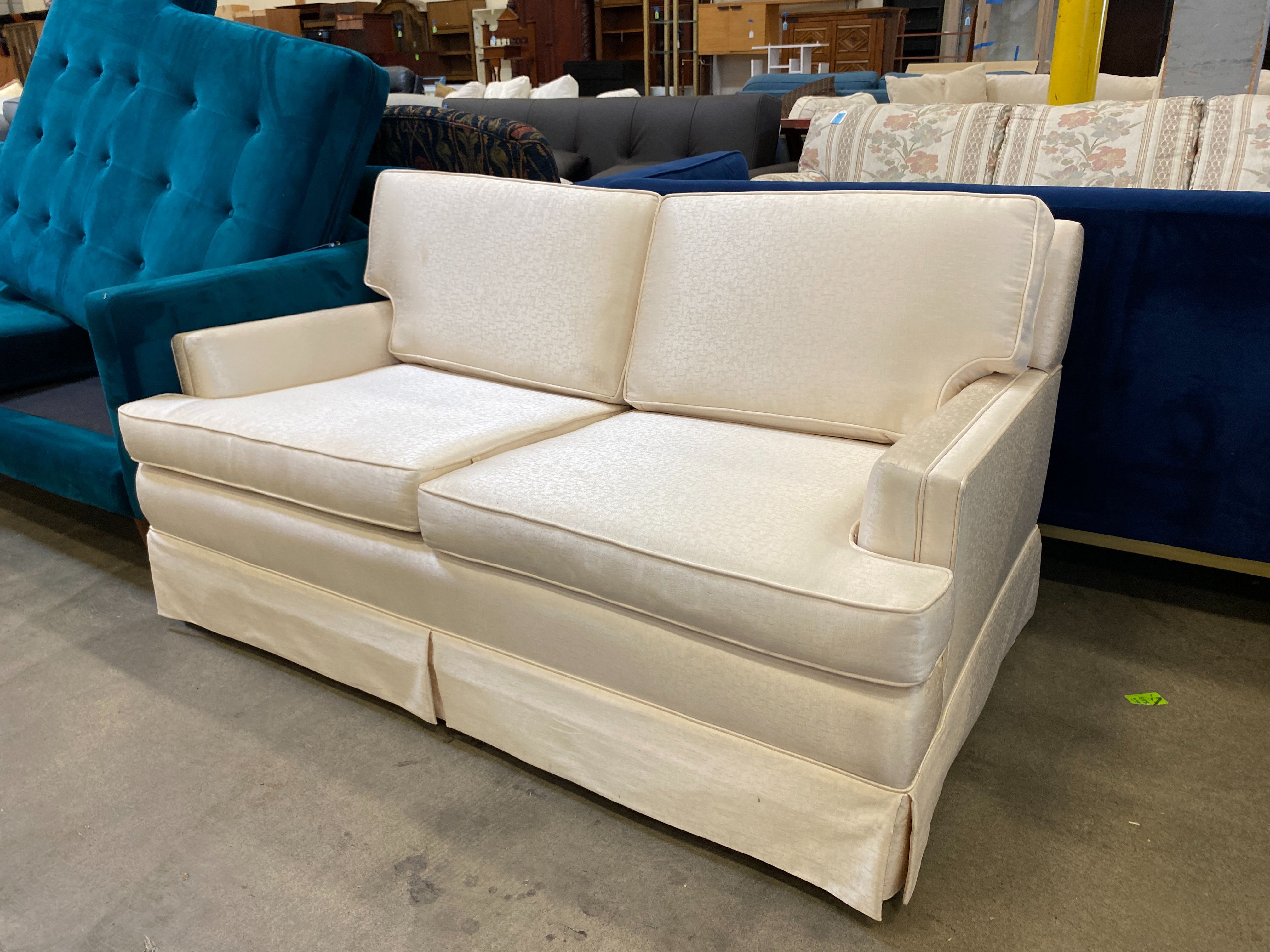 Well Maintained White Satin Skirted Loveseat