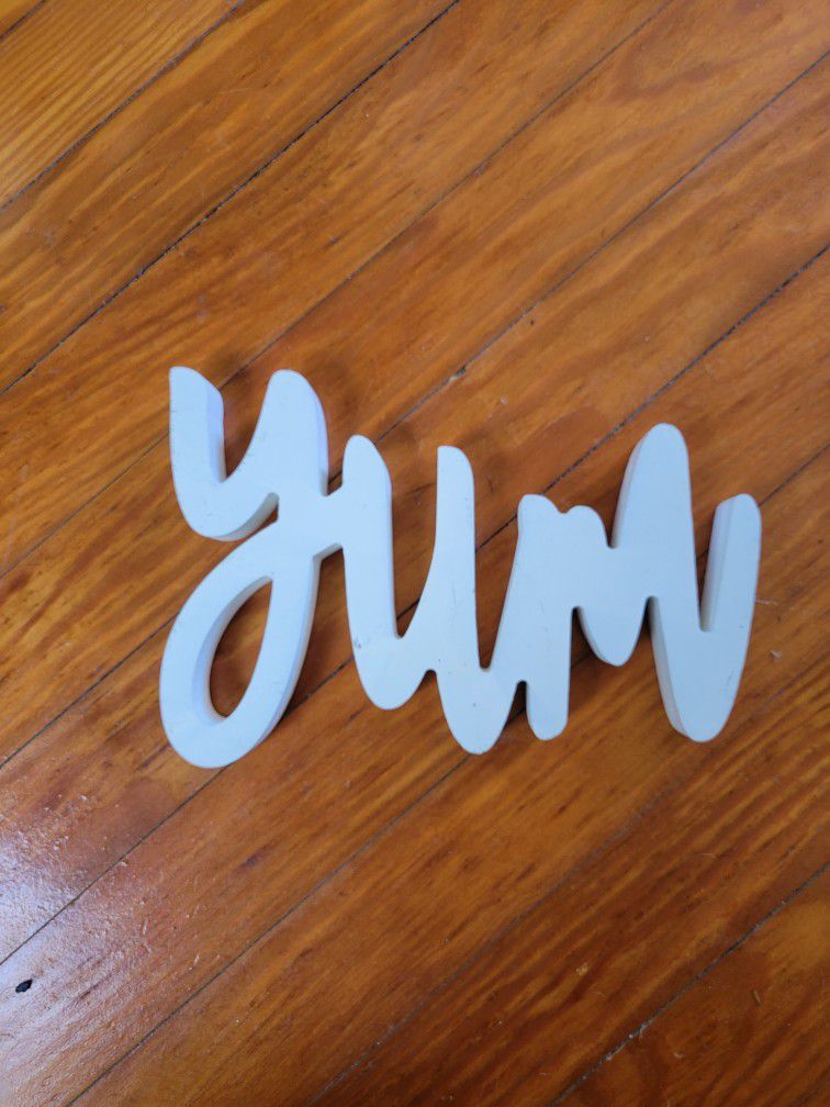 White Wooden "Yum" Script Sign