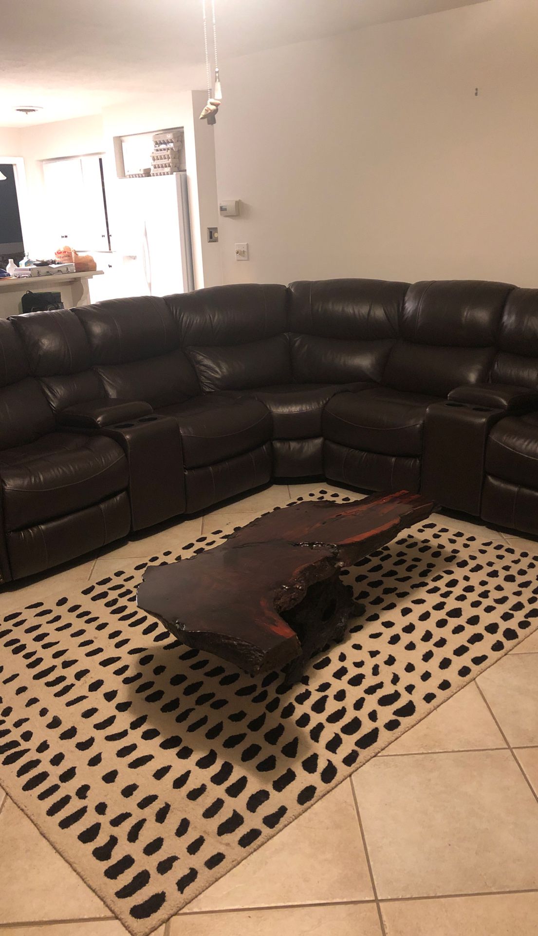 Brown leather reclining couch