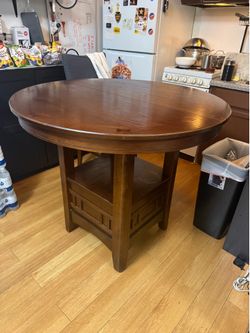 Brown Maplewood round Table