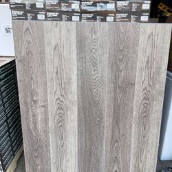 STAINMASTER PetProtect Lockhart Oak 20-mil x 7-in W x 48-in L Waterproof Luxury Vinyl Plank Flooring