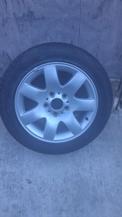 BMW 16in brushed aluminum  rim with tire