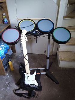 X box drum set and guitar
