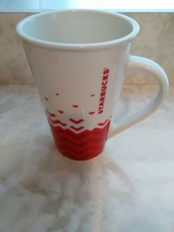 Starbucks 22 ounce tall coffee mug.