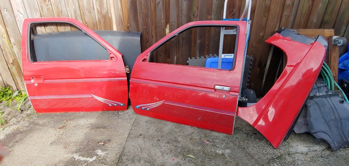 2 Nissan pickup doors no glass