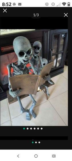 Metal outdoor/indoor Halloween decor - skeleton family reading on a bench   NEW WITH TAGS! RARE FIND! from Home Goods!