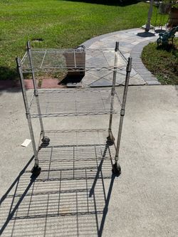 Shelf metal quit casters dim 23”x13”x33”