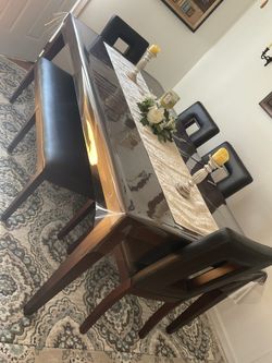 Dark Brown And Black Dining Table With Chairs