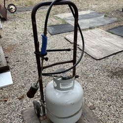 Propane torch soften asphalt