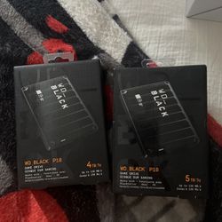 wd black 4 and 5 tb game drives $110 each new unopened