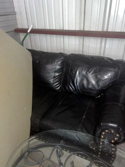 Black leather couch, Coffee And end tables