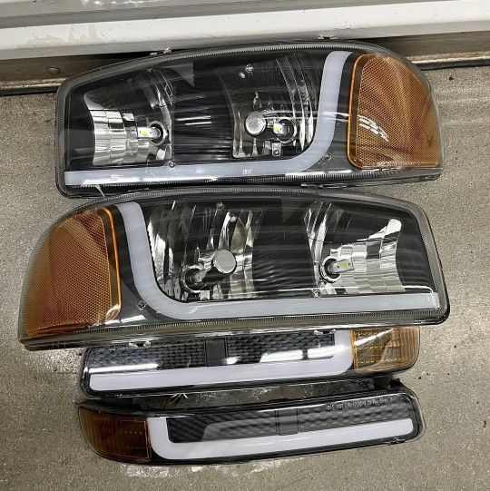 99-06  gmc sierra/ yukon/ yukon xl led sequential turn signal headlights  micas luces faros