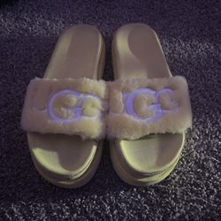 Yellow ugg slides 