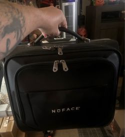 NŪFACE ROLLING CARRYING CASE