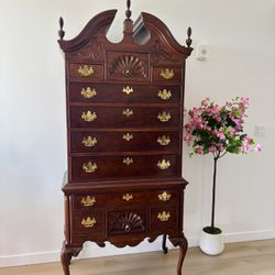 Beautiful wooden vintage dresser , material mahogany,brass Thomasville chippendale style bonnet. Top highbo 37”W x 20 “ D x 84” H ,working well all dr