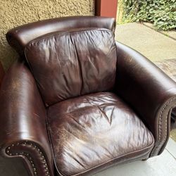 Free Leather Chair And Ottoman!