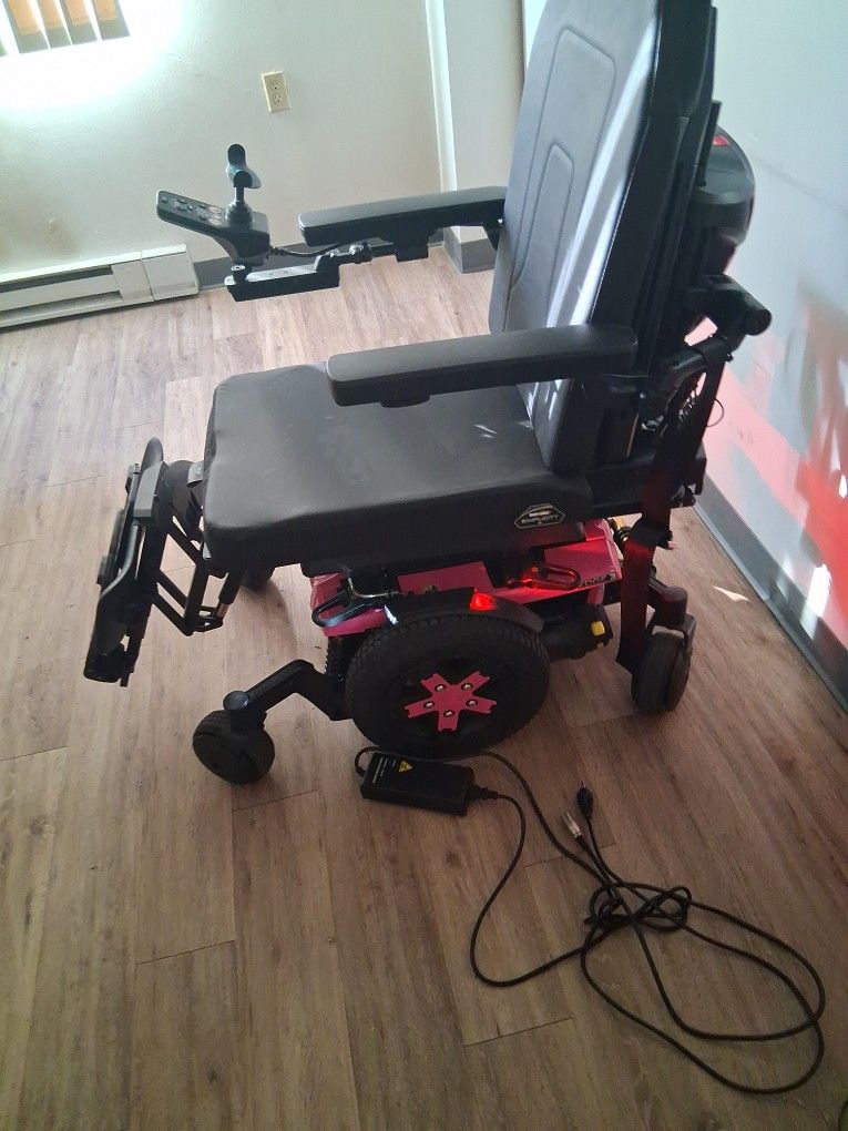Power Wheelchair Pink Hydraulic , legs and seat goes up and down