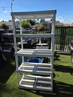 Plastic shelves by KETER