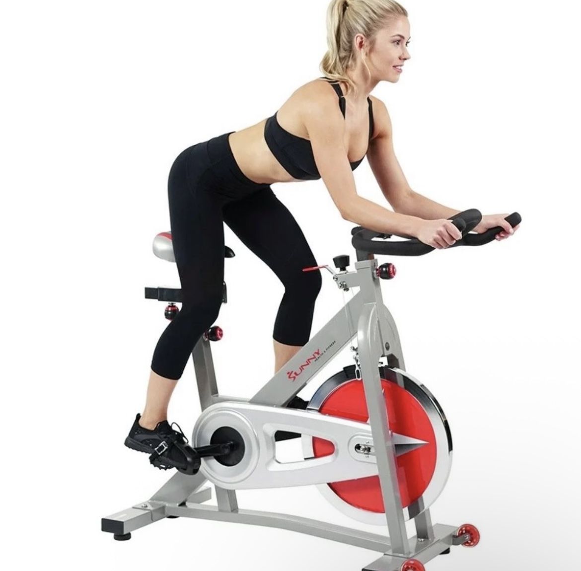 Sunny Health Fitness Exercise Bike, 30lb FlyWheel, Caged Pedals, 4 Way Seat, Multi Grip Handlebars