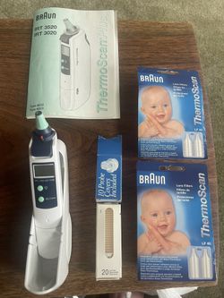 Thermo Scan Plus Ear Thermometer With 100 Plus Lens Filter Caps. New Batteries Installed. Used But Works Great