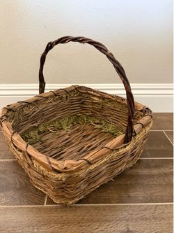 rustic handwoven willow branch twig basket