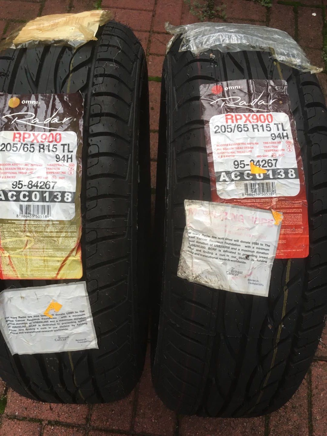 5 tires for sale and 2 of them are new ones