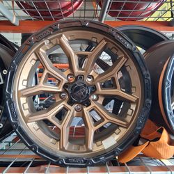 Used 17x9 5x127 bronze Jeep Wheels