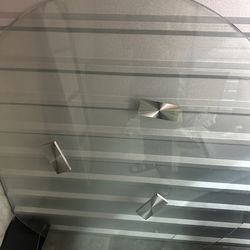 Round glass table (missing screws) — $40