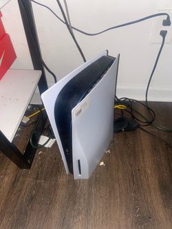 PS5 (disk version) with controller and 2k26