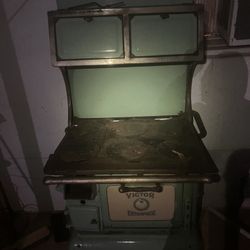 Antique 1940s Victor and enterprise cooking woodstove