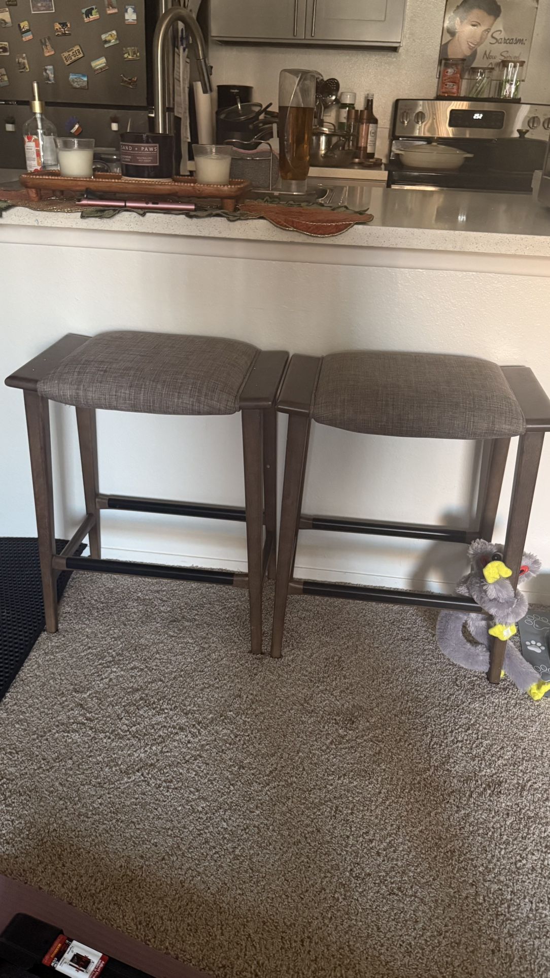 Two Wooden Counter-Height Stools with Padded Fabric Seats 