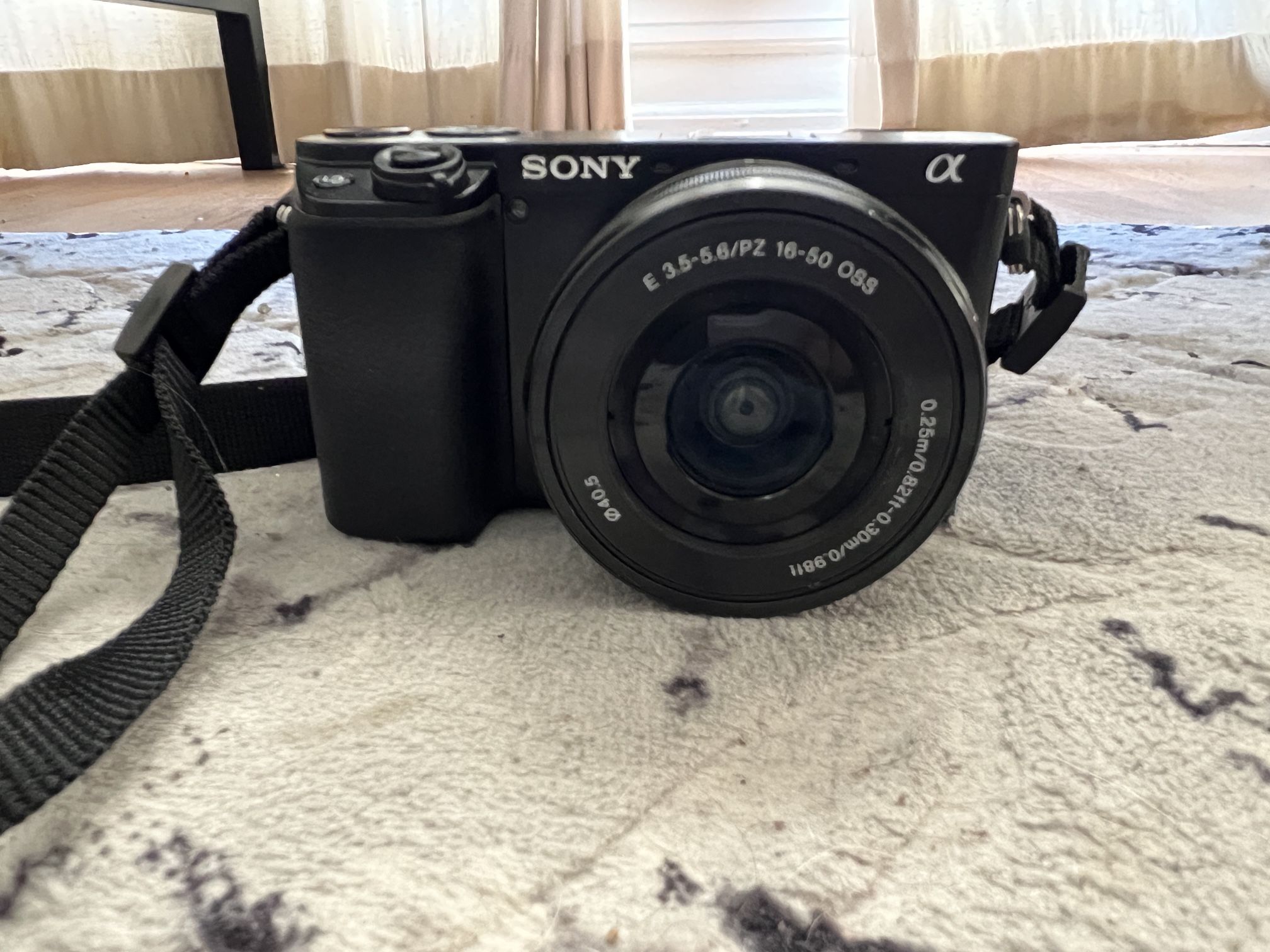 Sony Alpha A6100 Camera with 16-50mm Zoom Lens, Black (ILCE6100L/B)