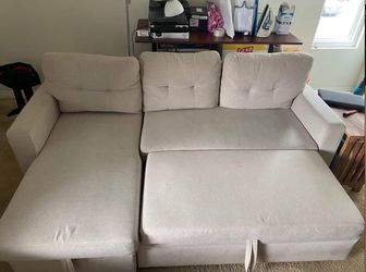 Light Beige Sectional Sofa with Sleeper & Reversible Chaise