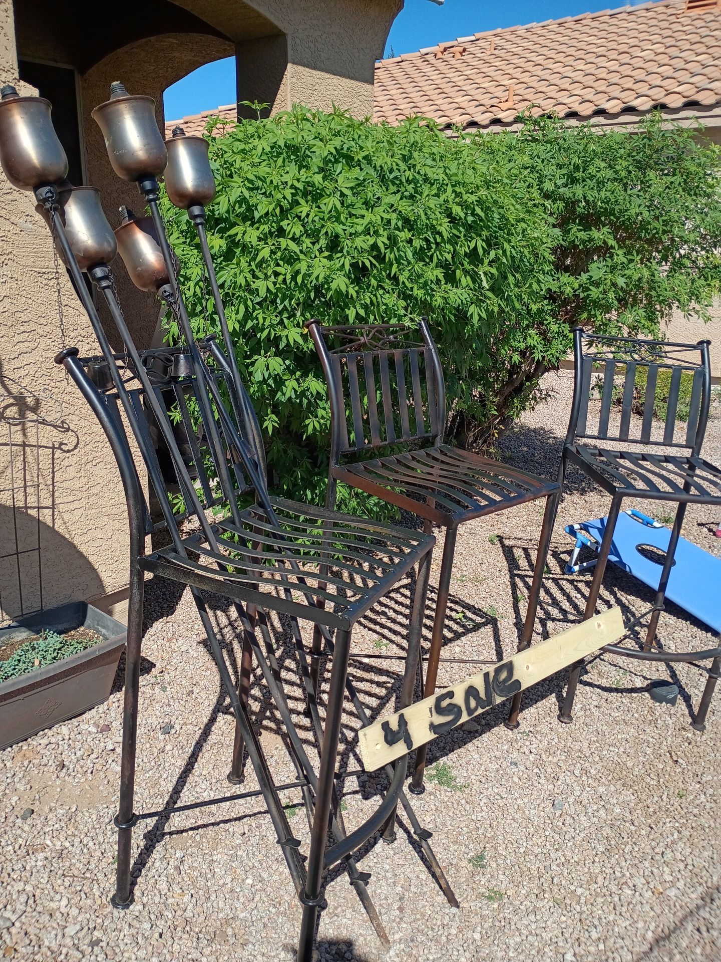 High top table chairs and teki torches