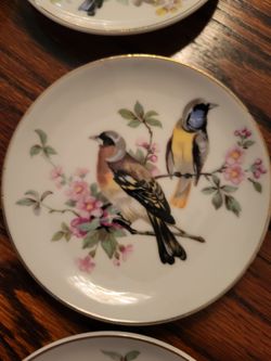 Norman Rockwell, mini plates, 3 inches perfect. They hang on ang on your wall