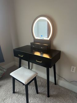 Vanity desk with lighted mirror