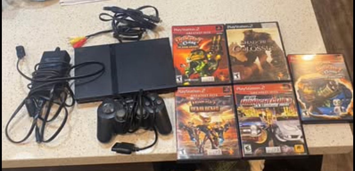 PS2 Slim w/ 5 Games (Ratchet & Clank, Shadow of Colossus, & Midnight Club 3)