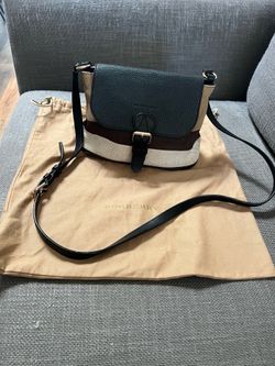 Woman’s Burberry bag, used