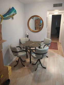 36 in glass table with four chairs